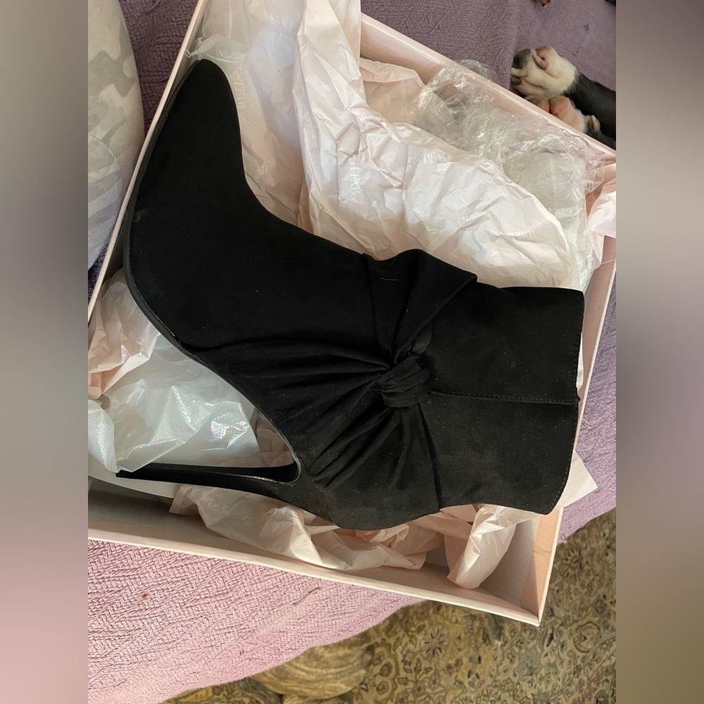 Black Short boots (booties) with heels.  Size 11.  Never worn